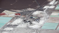 An aerial view shows the brine pools and processing areas of the Soquimich (SQM) lithium mine on the Atacama salt flat in the Atacama desert of northern Chile, January 10, 2013. (Credit: Ivan Alvarado/File Photo) Click to Enlarge.