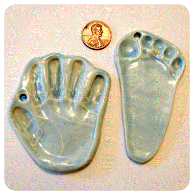 i got the baby's handprints and name added to me. Baby hand print tattoos i got the baby's handprints and name added to me. Baby hand print tattoos