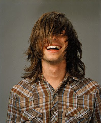 Young Man with Hair over His Eyes