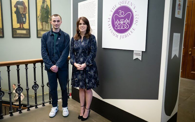 Princess Eugenie wore a navy ebony galaxy flippy dress from Whistles. the Queen's Jubilee Emblem Display at V&A Museum