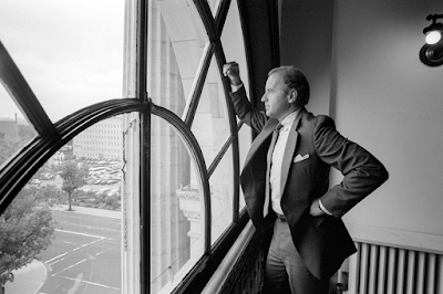 Joe Biden looking out window near his oSenate office in 1988