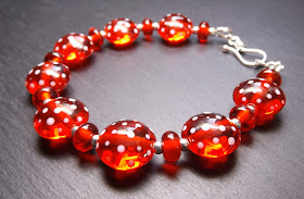 Lampwork glass bead and sterling silver bracelet by Laura Sparling