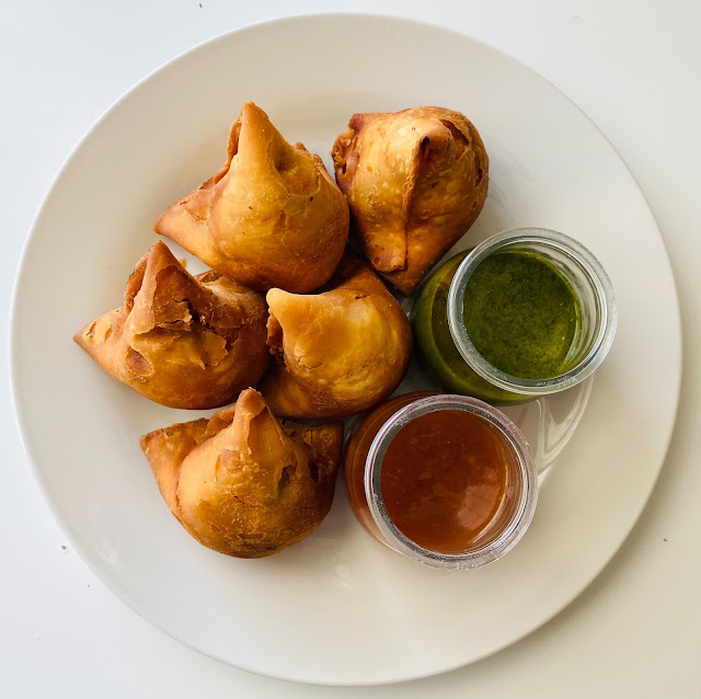 Enjoy Homemade Samosas with Red and Green Chuttney (Cold Sauce)