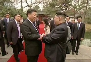 Kim Jong Un et Xi Jinping 