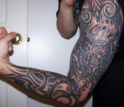 arm sleeve tattoo. Tribal Half Sleeve Tattoos