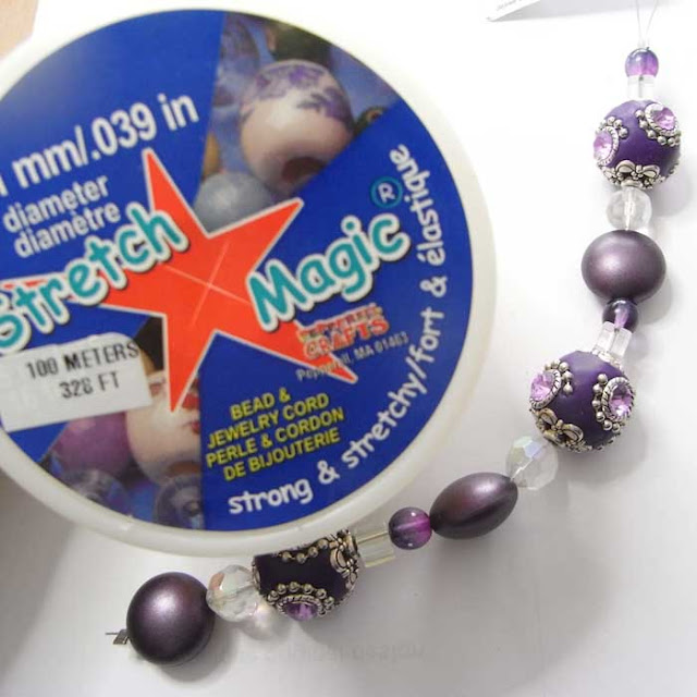 Stretch Magic beading elastic and strand of purple Kashmiri beads