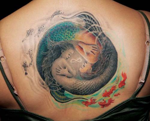 ying yang tattoos on back body women