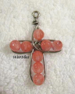 wire cross with cherry quartz