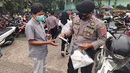 Disiplinkan Prokes kepada Masyarakat, Satgas III Aman Nusa Polres Serang Bagikan Masker