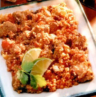 Lamb couscous: Classic moroccan stew of spiced lamb served on a bed of couscous.