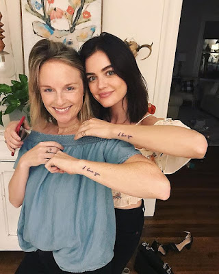 Lucy Hale and sister Maggie matching "I love you" tattoos in grandmother's handwriting