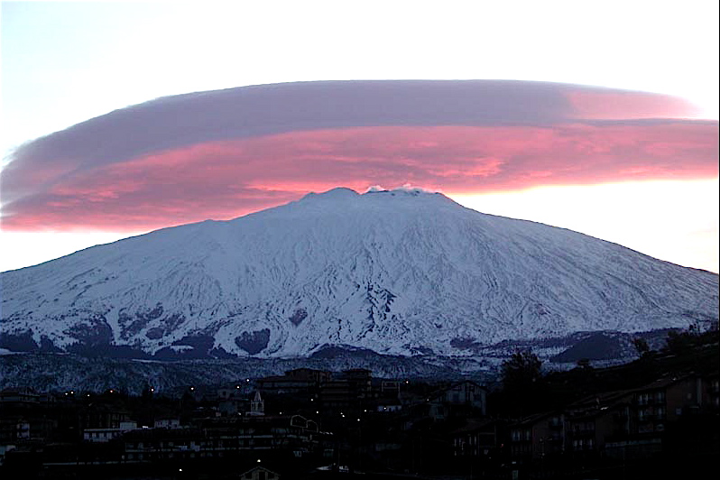 Sunrise on a lenticular cloud over Sicily's Mount Etna