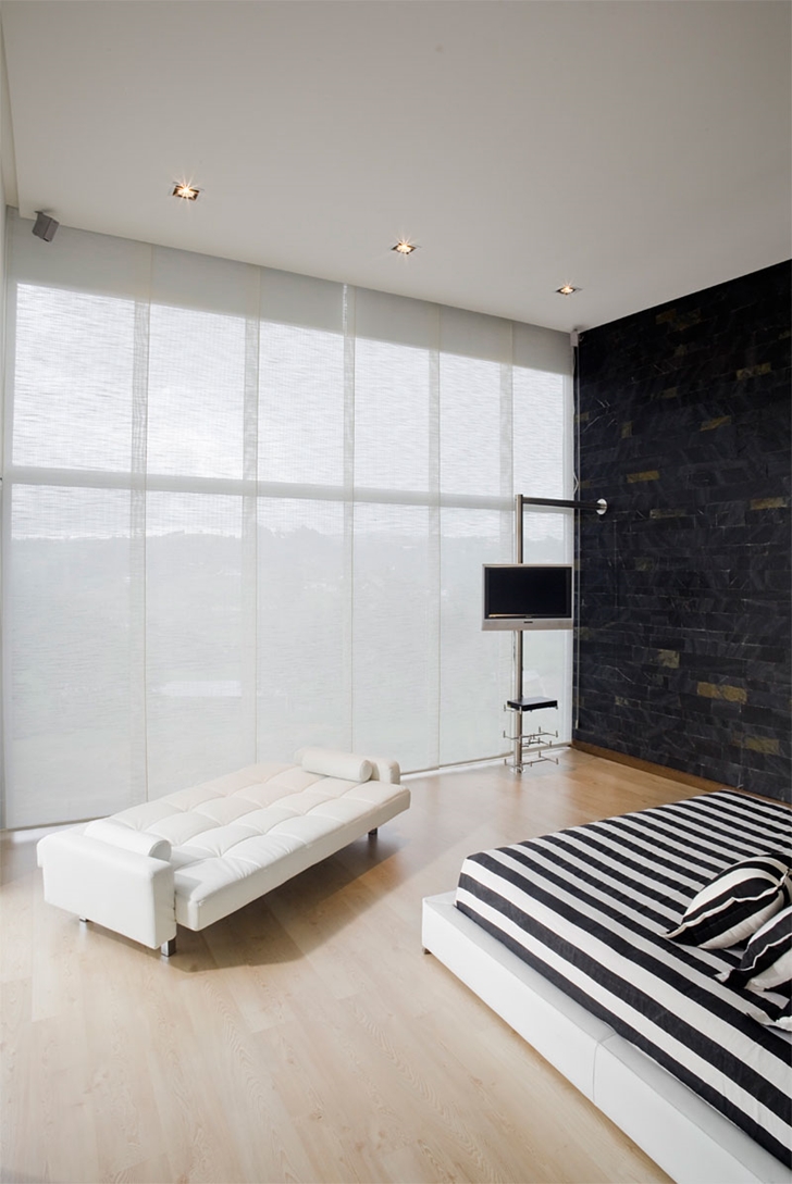 Bedroom in Modern architecture house by Carlos Molina