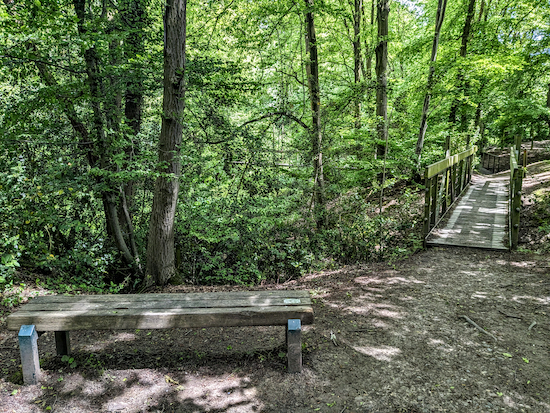 Cross the footbridge then turn left