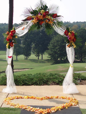 Beautiful simple wedding arch with synthetic flower