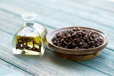 Clove Essential Oil : Benefits , Side Effects ,How to Make at Home & Precautions