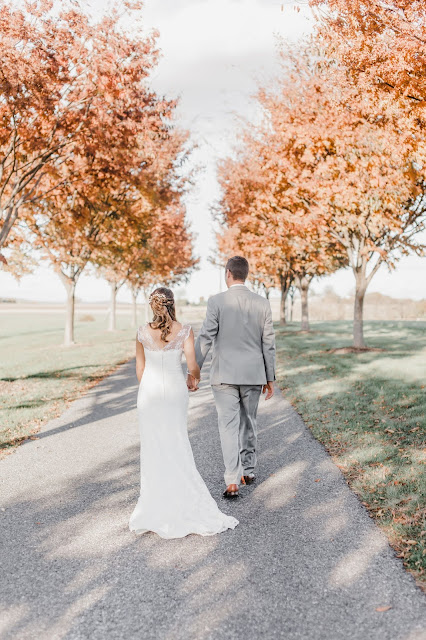 bride and groom fall trees