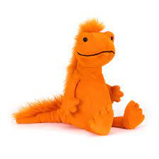 Orange crested newt soft toy sitting in front of a white background. The newt is smiling.