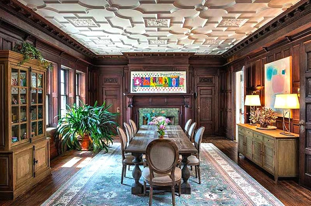 Dining room carved ceilings wood paneled walls in the Copper Beech Farm manison