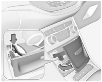 Fold the left side of the cover forwards. Take care that the securing clamp is guided as shown in the illustration