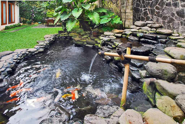 Jasa pembuatan dekorasi kolam tebing,dekorasi relief air terjun jombang