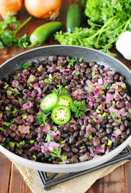 Seasoned Black Beans ~ a quick side dish loaded with flavor & on the table in under 15 minutes!  www.thekitchenismyplayground.com