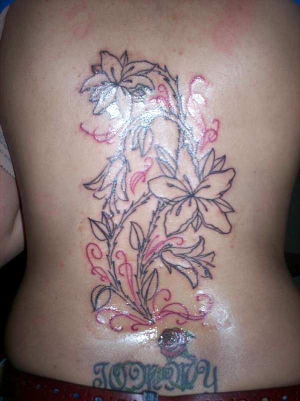Flower Tattoos For The Lower Back. Permanent Cross Flower Tattoos