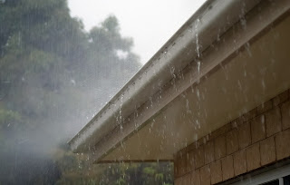 rain dripping off gutters