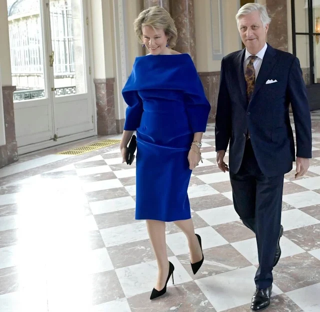 Queen Mathilde wore a royal blue velvet flexible scuba dress by Natan for the European institutions meeting