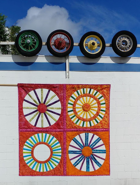 Open weaving circle quilt using Island Batik fabrics