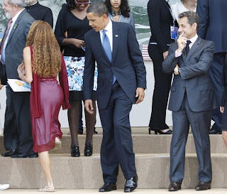A deceiving image of U.S. President Barack Obama staring at Mayora Tavares butt while French President Nicolas Sarkozy noticing