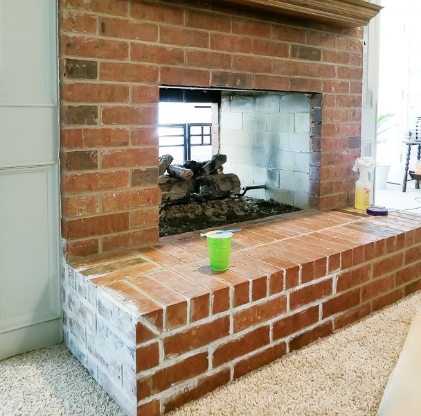 dirty red brick fireplace