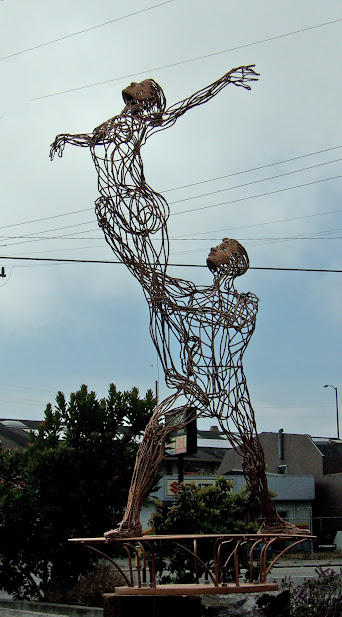 Sculpture Of a Couple Ascending to Heaven. At a Shopping Mall in Eureka, CA, USA