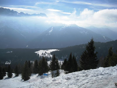 Sunshine and cloud obscuring mountains and slopes