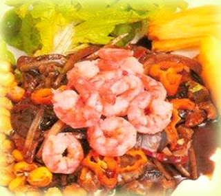 Cebiche de conchas negras y langostinos