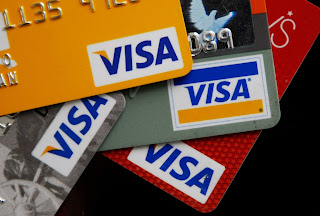 Photo of Visa credit cards.