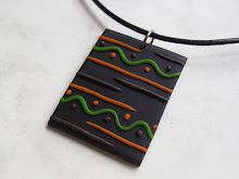 Polymer clay pendant by WindySunset