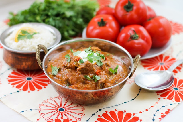 Food Lust People Love: Ripe, juicy tomatoes add a wonderful fresh zing to the fragrant sauce in this easy lamb and fresh tomato curry. Cook it down slowly to intensify the flavors.