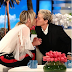 Ellen DeGeneres and wife, Portia de Rossi share a kiss as they celebrate National Coming Out Day 