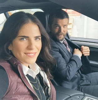 Charlie Weber clicking selfie with his co-actor while sitting in a car