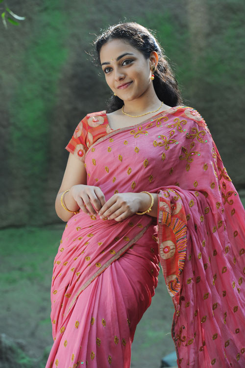Nitya Menon Latest Cute Stills Nitya Menon New Spicy Images In Saree gallery pictures