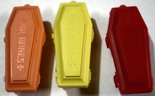 Orange, yellow and red Mr Bones coffins