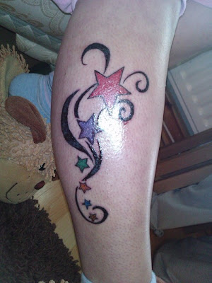 star tattoos on leg