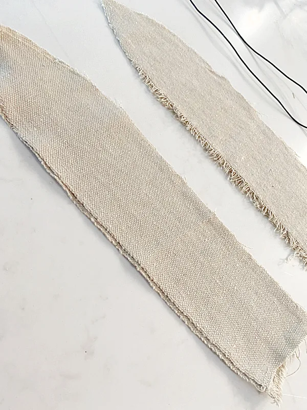 strips of muslin for ears and wire