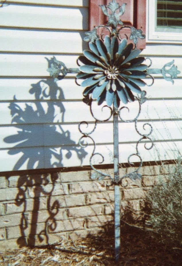 Cross and Sunflower (Sculpture by Lilo Bauer-Frietag)