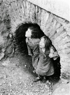 Children take refuge during the Francoist bombing over Madrid (1936–1937). In spite of that, Republicans managed to repulse this siege.