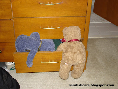 Teddy bears going through drawer