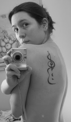 treble clef tattoo,  treble clef tattoos, music tattoo, guitar tattoos, guitar tattoo designs, guitar tatoo, back shoulder tattoos 