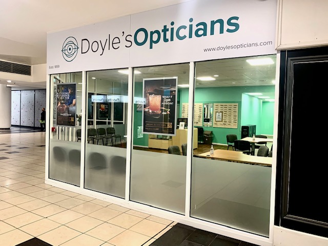 Exterior of Doyle's Opticians in the W12 centre, Shepherds Bush