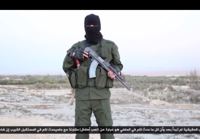 ISIS militant threatening Israel in Hebrew